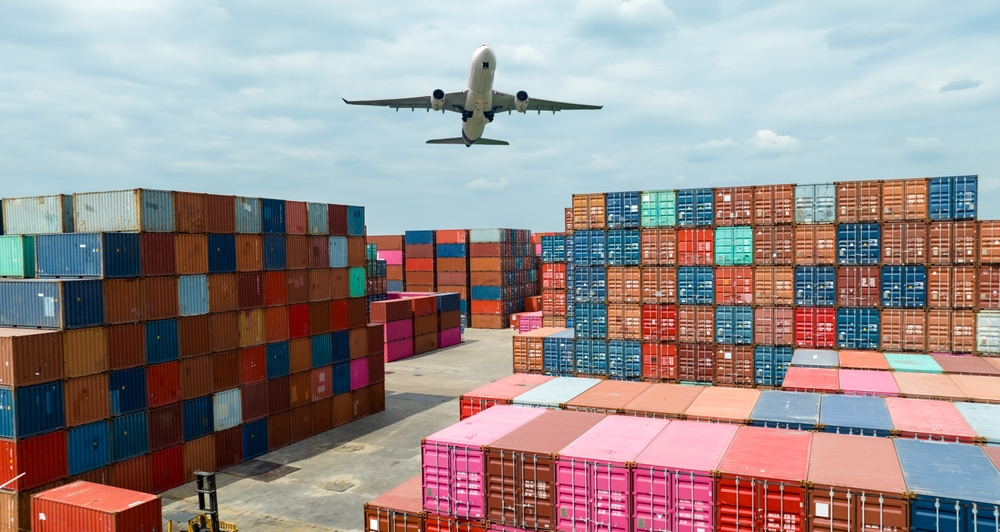 Airplane,Flying,Above,Container,Logistic.,Container,Crisis.,Freight,Transportation.,Logistic